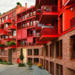 red facades with cubic balconies of new residential architecture in Berlin